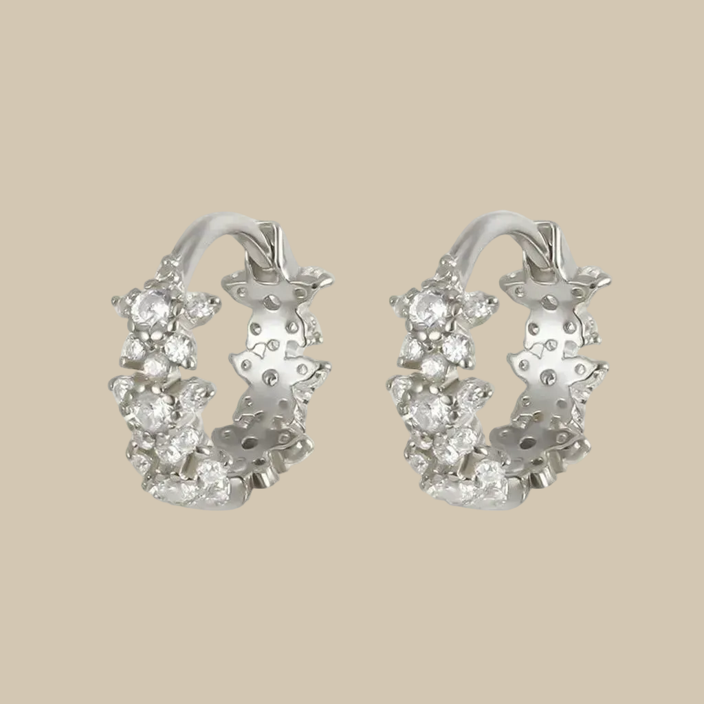 Silver-coloured flower-detail hoop earrings set with clear stones