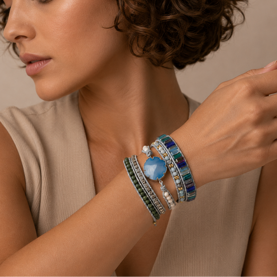 Azure Drift Bracelet worn on the wrist, with layered pale and multicoloured bead strands