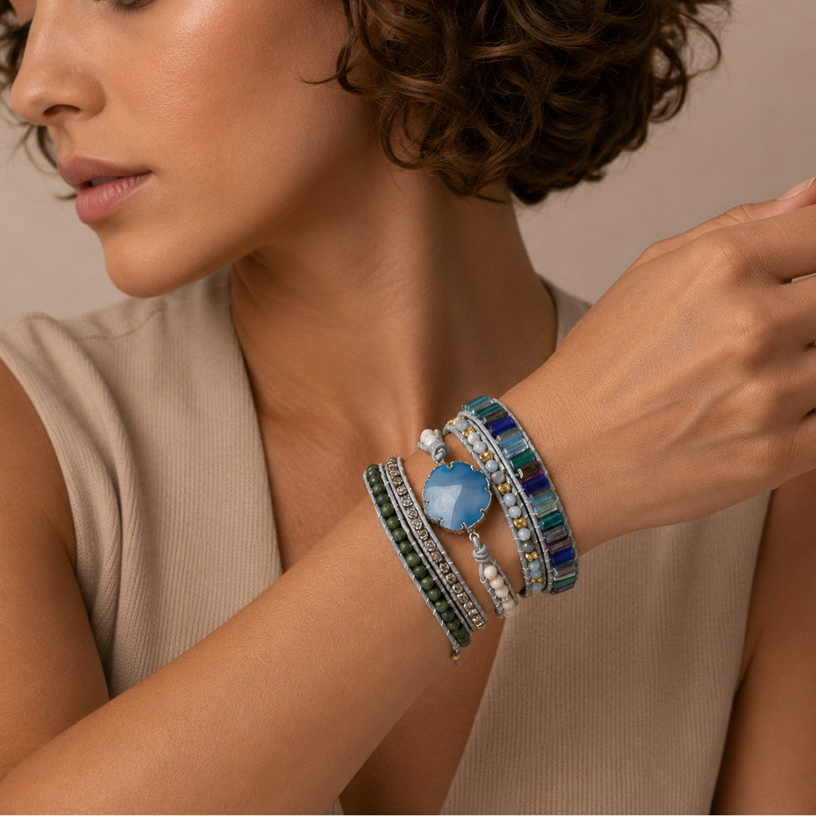 Azure Drift Bracelet worn on the wrist, with layered pale and multicoloured bead strands
