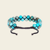 Azure Knot Bracelet with two rows of turquoise-coloured round beads on dark cord