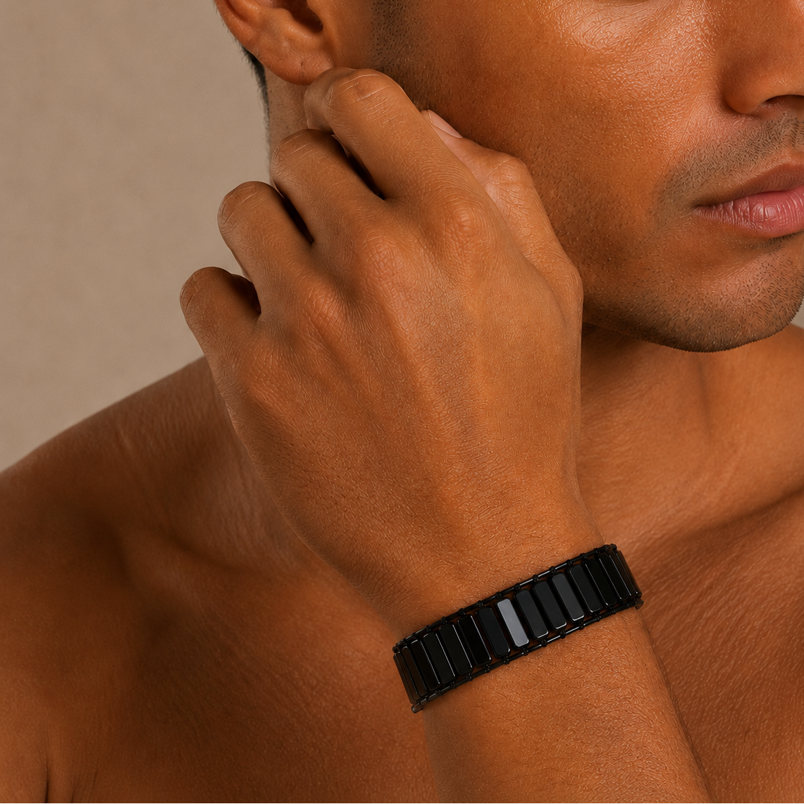 Blackline Tile Bracelet worn on the wrist, with black rectangular beads and dark cord
