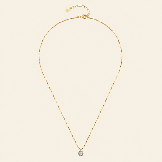 Blue Halo Necklace with a round pendant with blue and clear stone accents in gold finish