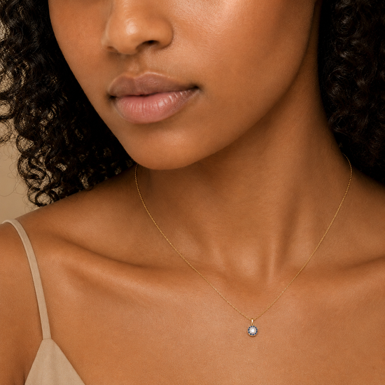 Blue Halo Necklace worn at the neckline in gold finish