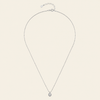 Blue Halo Necklace with a round pendant with blue and clear stone accents in silver finish