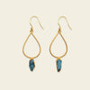 Blue Stillness Earrings with open teardrop frames and blue stone drops