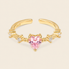 Blush Heart Ring with a pink heart-shaped stone and clear shoulder accents in gold finish