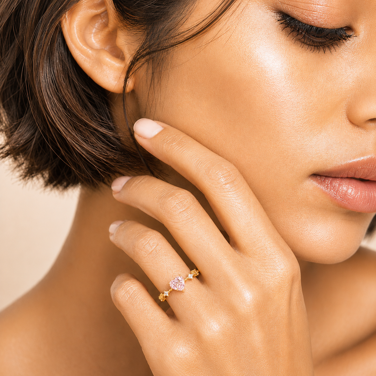 Blush Heart Ring worn on the hand in gold finish