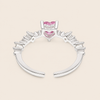 Blush Heart Ring with a pink heart-shaped stone and clear shoulder accents in silver finish