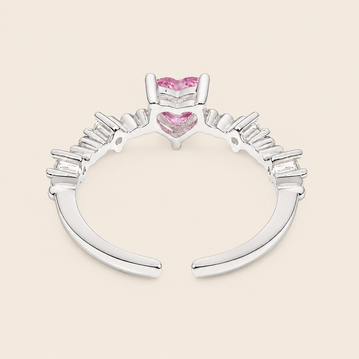 Blush Heart Ring with a pink heart-shaped stone and clear shoulder accents in silver finish