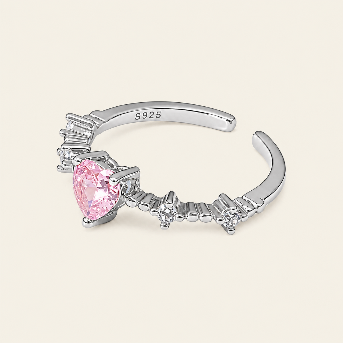 Blush Heart Ring with a pink heart-shaped stone and clear shoulder accents in silver finish