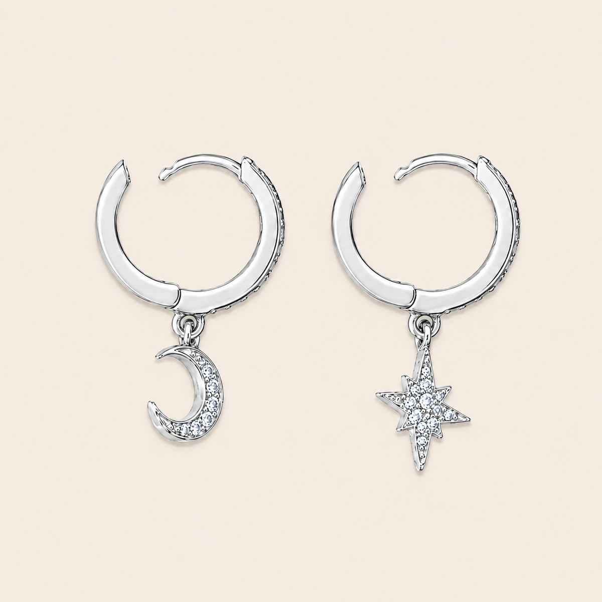 Celestial Light Earrings with crescent moon and star charms on small hoops in silver finish