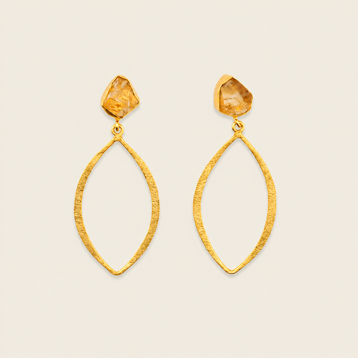 Citrine Orbit Earrings with pale amber-coloured stones above open oval drops