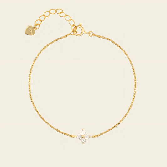 Clover Light Bracelet with a four-petal clear stone motif on a fine chain in gold finish