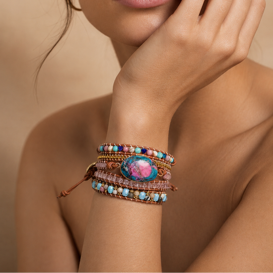 Colour Axis Bracelet worn on the wrist, with layered pink and multicoloured beads