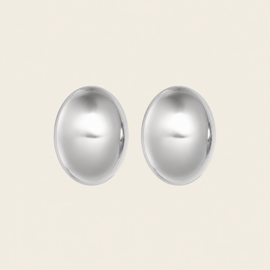 Contour Dome Earrings with rounded oval dome-shaped studs in silver finish