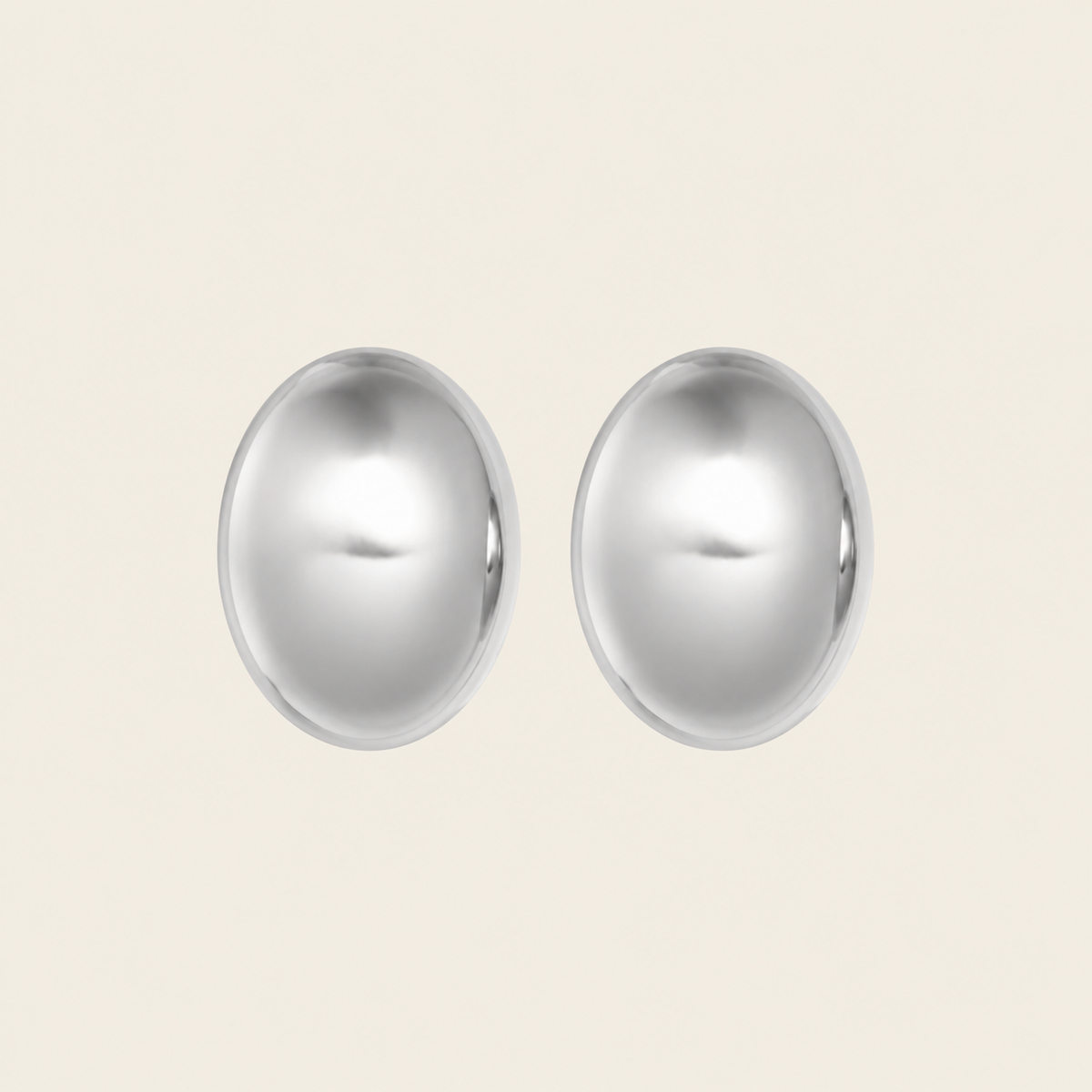 Contour Dome Earrings with rounded oval dome-shaped studs in silver finish