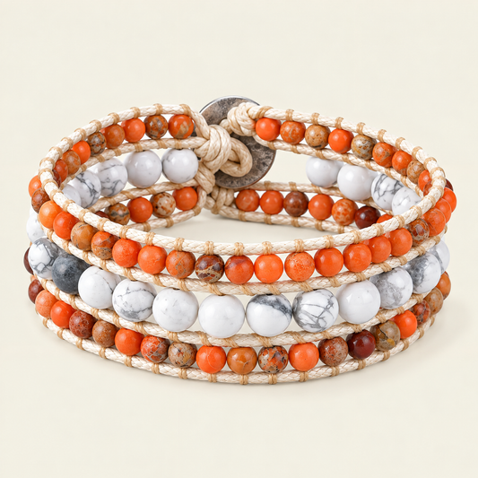Coral Drift Bracelet with orange and white beads on a layered cord wrap