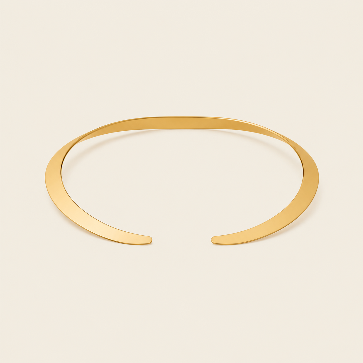 Crescent Collar Necklace with a smooth curved collar band in gold finish