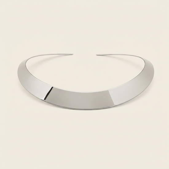 Crescent Collar Necklace with a smooth curved collar band in silver finish