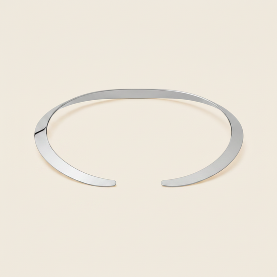 Crescent Collar Necklace with a smooth curved collar band in silver finish