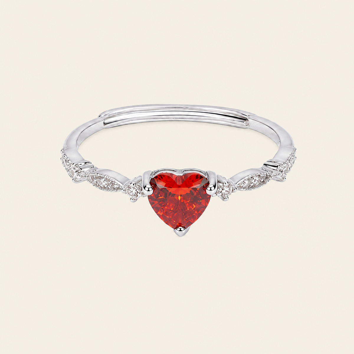 Crimson Heart Ring with a red heart-shaped stone and clear accents in silver finish