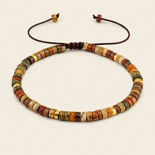 Desert Strata Bracelet with earth-toned stone discs on an adjustable cord