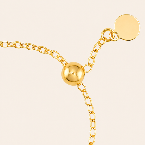 Dewdrop Chain Ring with an adjustable fine chain band in gold finish