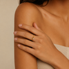 Dewdrop Chain Ring worn on the hand in gold finish