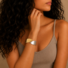 Dual Sweep Cuff worn on the wrist in gold and silver finish