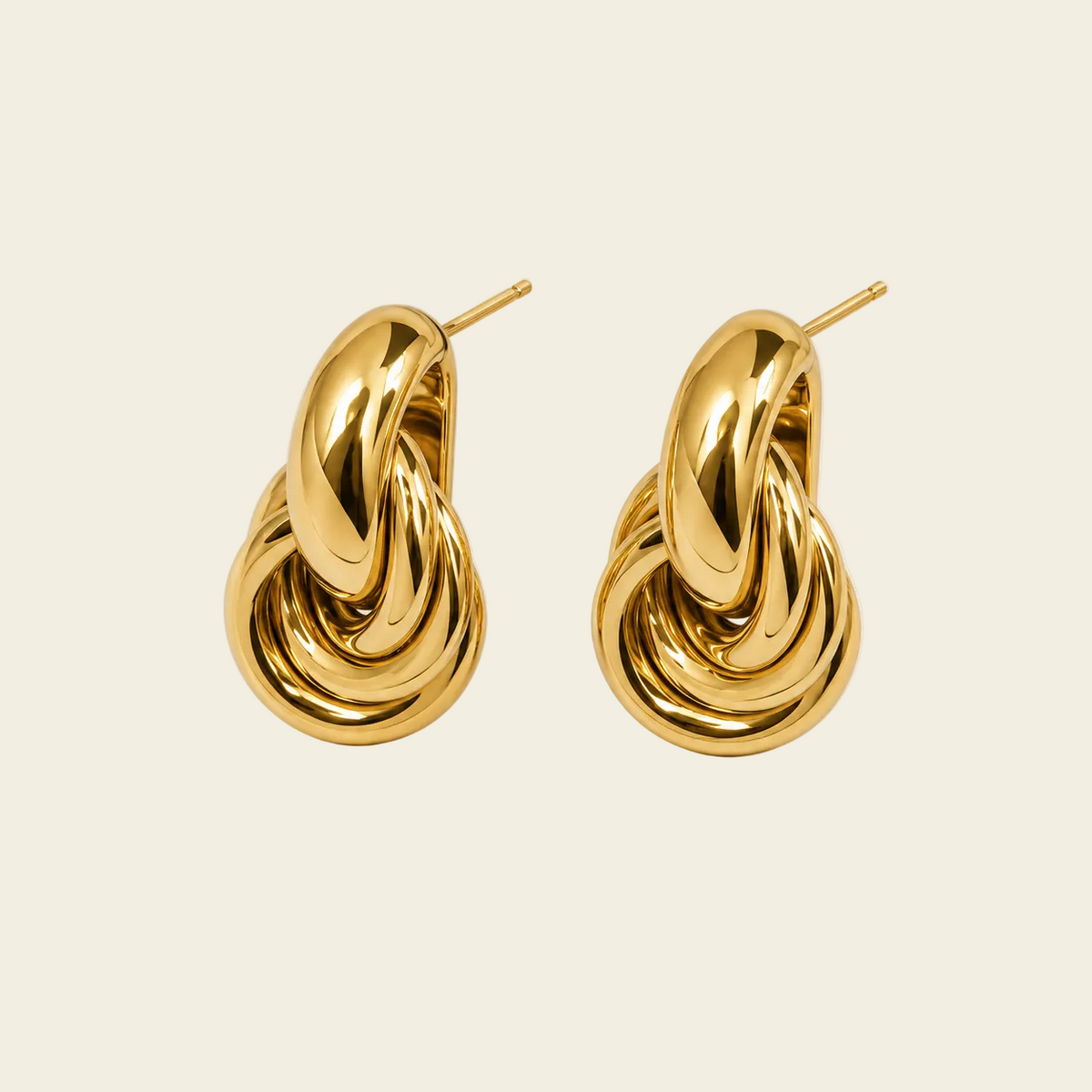 Echo Loop Earrings with interlocking sculptural loop drops in gold finish