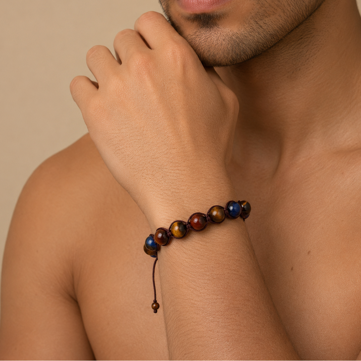 Ember Drift Bracelet worn on the wrist, with round stone beads on an adjustable cord