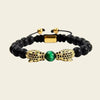 Emerald Leopard Bracelet with dark beads, a green centre bead and gold-coloured leopard accents