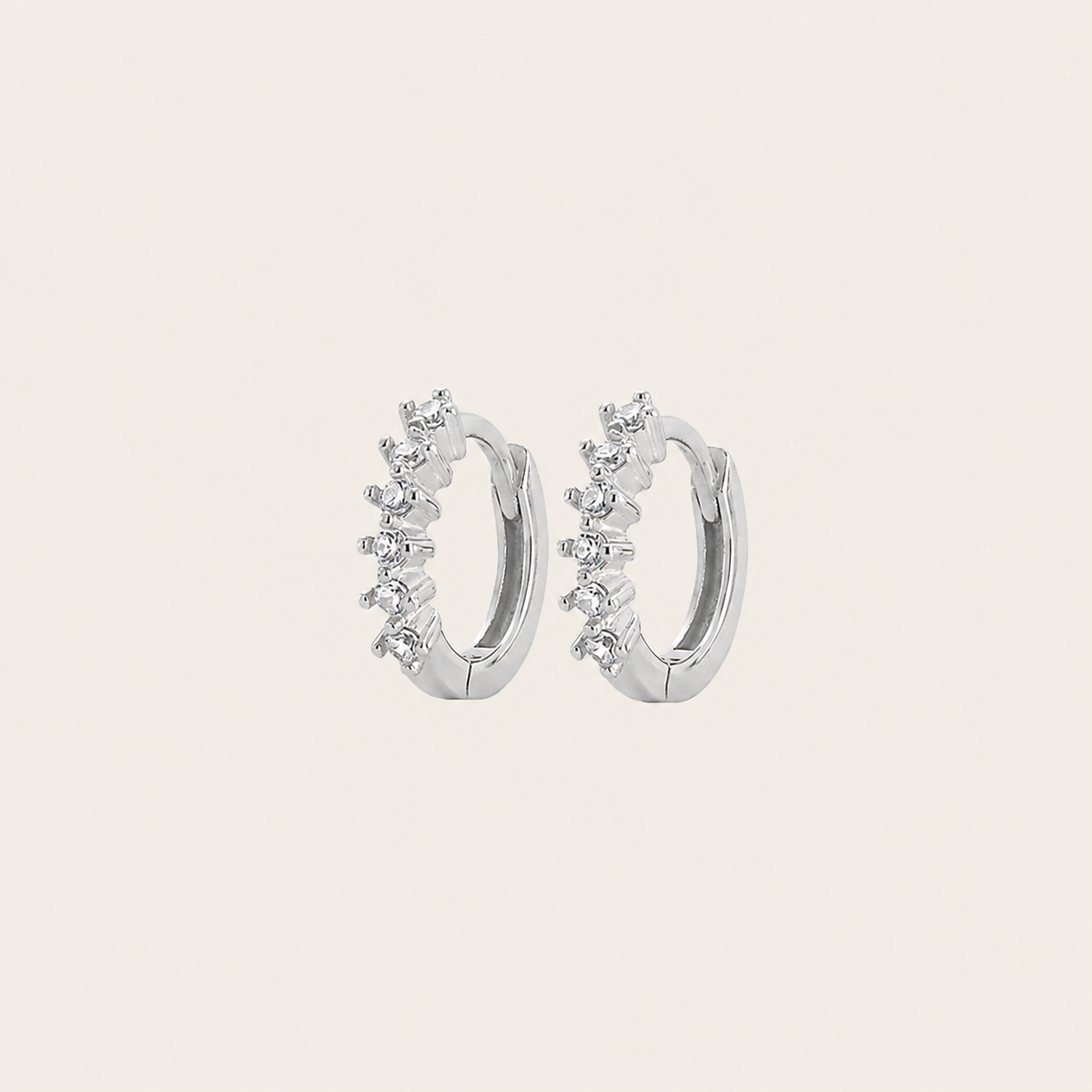 Fine Light Earrings with small hoops set with clear stones in silver finish