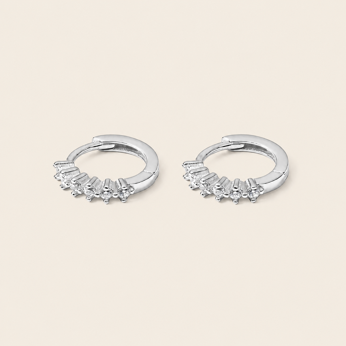 Fine Light Earrings with small hoops set with clear stones in silver finish