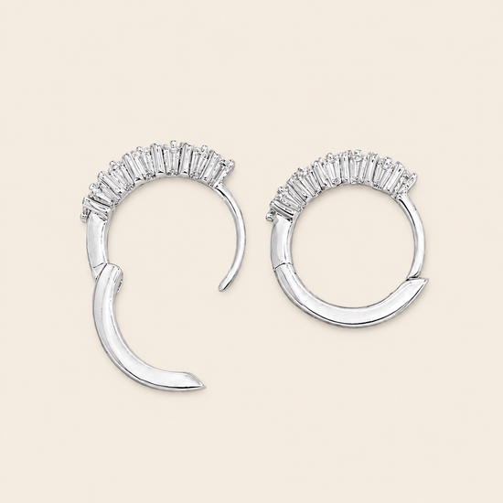 Fine Light Earrings with small hoops set with clear stones in silver finish