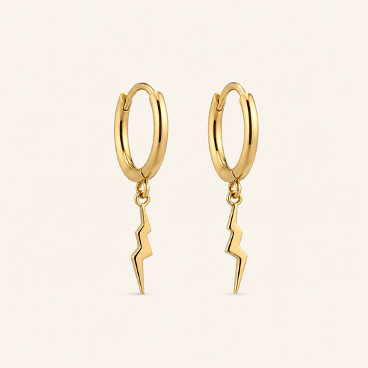 Fine Strike Earrings with lightning-bolt charms on small hoops in gold finish