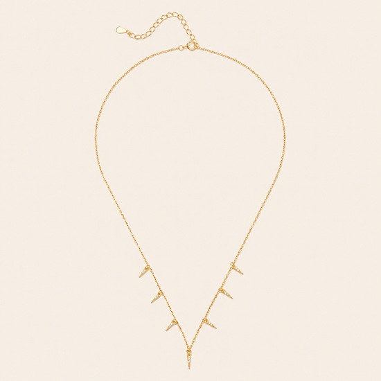 Fine Trace Necklace with a fine chain with small tapered drops in gold finish