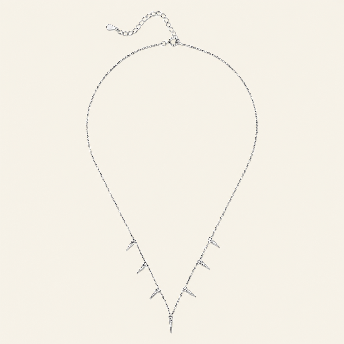 Fine Trace Necklace with a fine chain with small tapered drops in silver finish