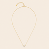 Fine Trio Necklace with a small triangular cluster of clear stones in gold finish
