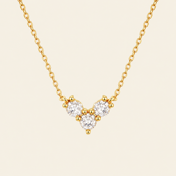 Fine Trio Necklace with a small triangular cluster of clear stones in gold finish
