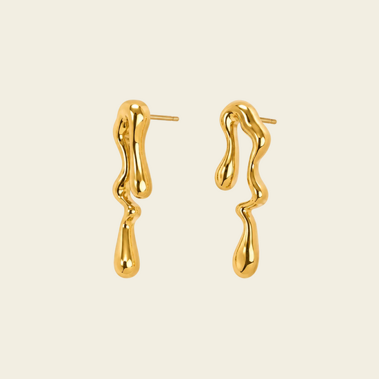 Flowing Line Earrings with flowing open shapes and small hanging drops in gold finish