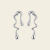 Flowing Line Earrings with flowing open shapes and small hanging drops in silver finish