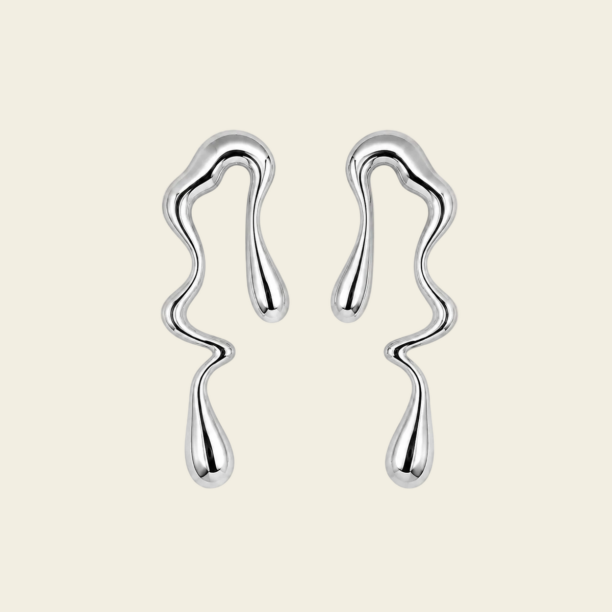 Flowing Line Earrings with flowing open shapes and small hanging drops in silver finish