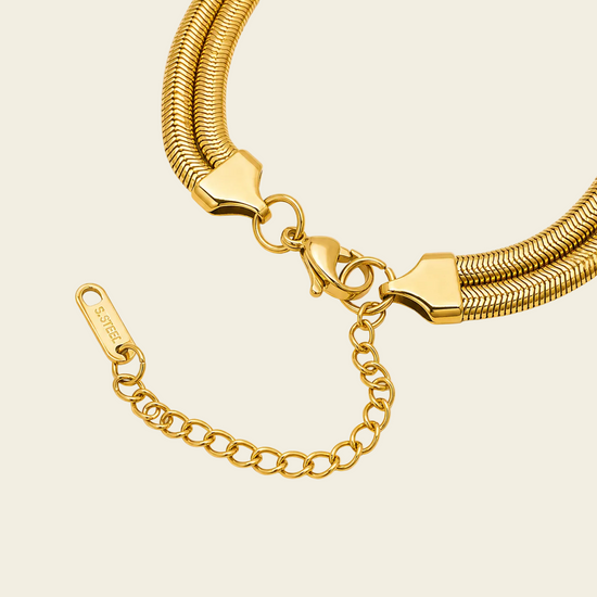 Fluid Knot Bracelet, showing the fastening detail in gold finish