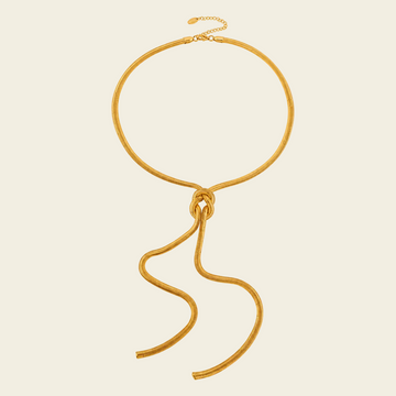 Fluid Knot Necklace with a smooth collar and flowing knotted lariat drop in gold finish
