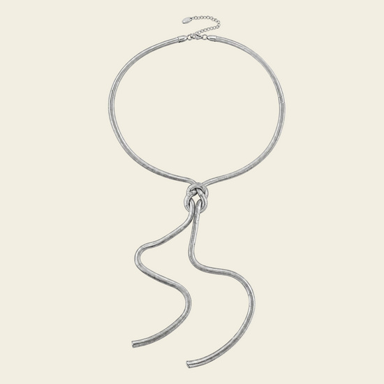 Fluid Knot Necklace with a smooth collar and flowing knotted lariat drop in silver finish