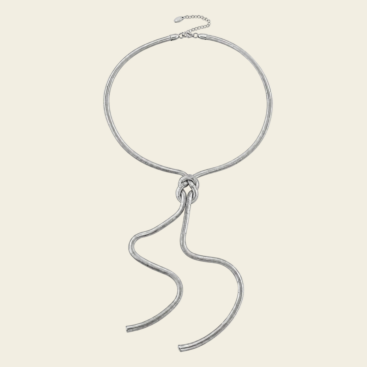 Fluid Knot Necklace with a smooth collar and flowing knotted lariat drop in silver finish