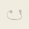 Fluid Teardrop Cuff with an open band with unequal teardrop ends in silver finish