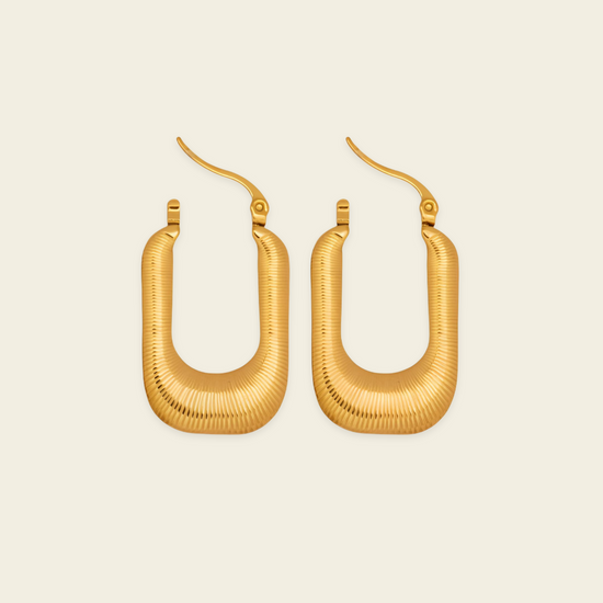 Fluted Arc Earrings with elongated rectangular hoops with ridged surfaces in gold finish