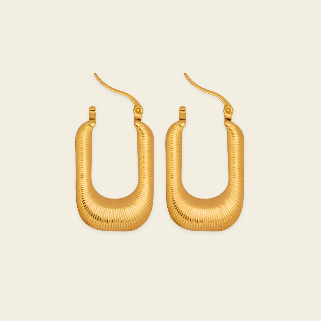 Fluted Arc Earrings with elongated rectangular hoops with ridged surfaces in gold finish
